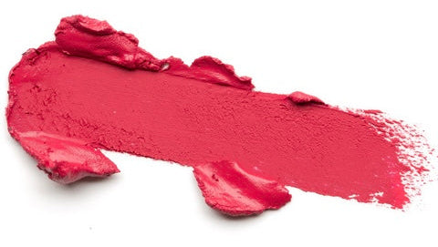 Pink lipstick swatch on a white background